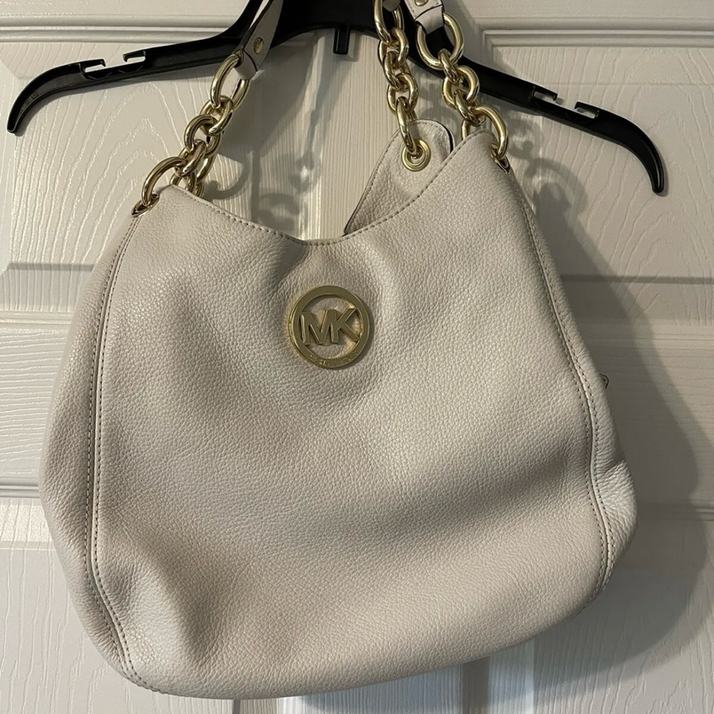 Michael Kors white leather handbag.